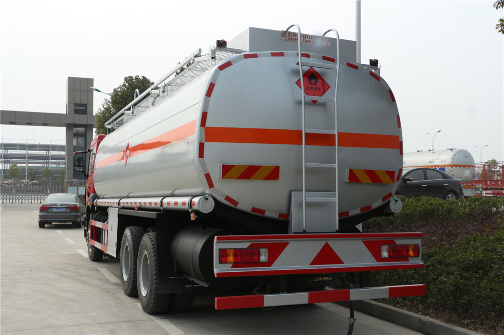 After liberation, an 8-wheel [23-cubic] oil tanker