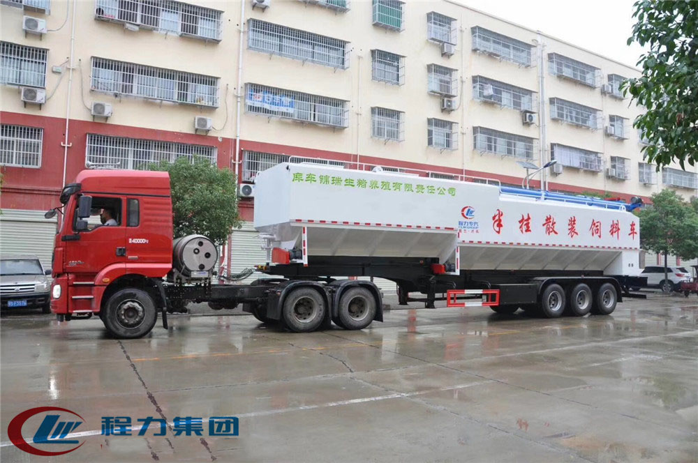 Half-trailer [60-66 cubic] bulk feed transportation vehicle