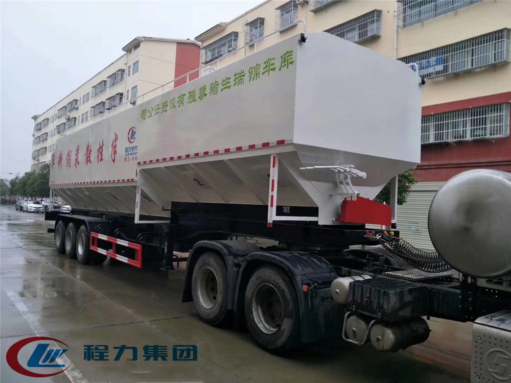 Half-trailer [60-66 cubic] bulk feed transportation vehicle
